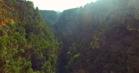 Going Deep Inside Canyon at Sunset, 4k Drone Shot Stock Footage 147091726