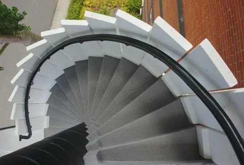 Going down the circular stair Stock Photos