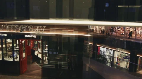 Going down from an elevator in a big shopping mall Stock-Footage 51627523