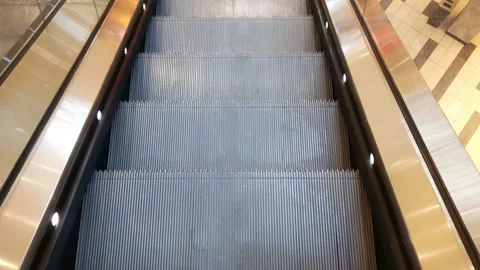 Going down the elevator in a shopping mall or subway. 스톡 동영상 156892371