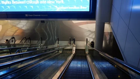 Going down an empty escalator Stock Footage 128405683