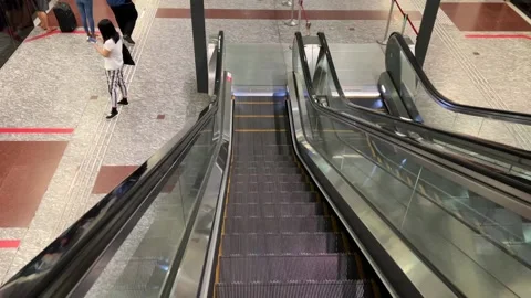 Going Down Escalator at Downtown Line MRT Stock Footage 168119587