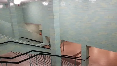 Going down the escalator in an empty subway station Stock Footage 79848857