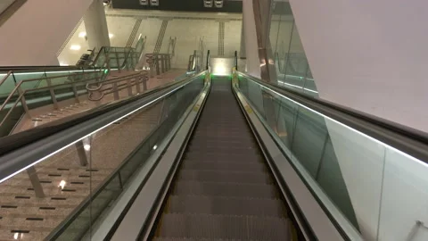 Going down an escalator at São Paulo Airport Stock Footage 186769983