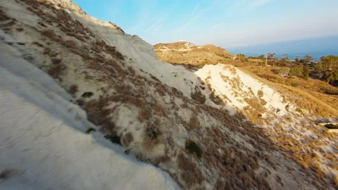 Going Down The Mountain Cliff Towards The Sea Stock Footage 285326756