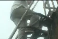 Going down oil rig ladder in bad weather and fog Footage