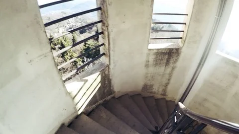 Going down the stairs in the tower Stock Footage 72654131