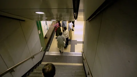 Going Down Stairs To Underground Subway Station - Hong Kong Stock Footage 91987390