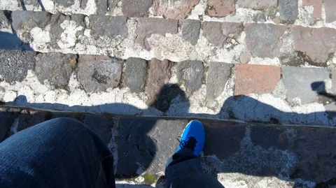 Going down stone stairs on the pyramid of the sun in Teotihucan, Mexico Stock Footage 97874623