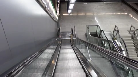 Going down the subway escalator Stock Footage 271639074
