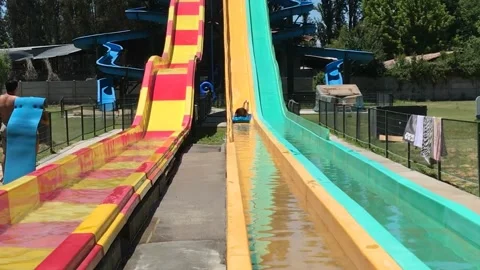 Going down the water slide Stock Footage 156829057