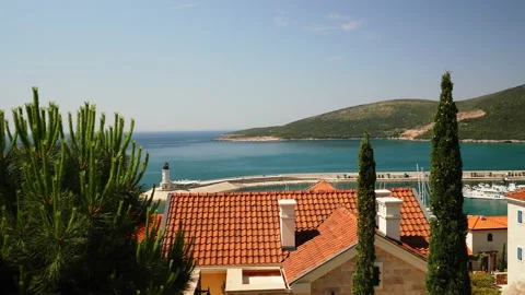 Going Downstairs in Old town with Orange roofs and stone facade in Montenegro on Stock Footage 201412676