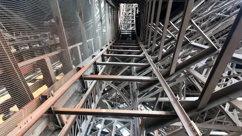 Going up the Eiffel Tower in Paris Stock Footage 124806774