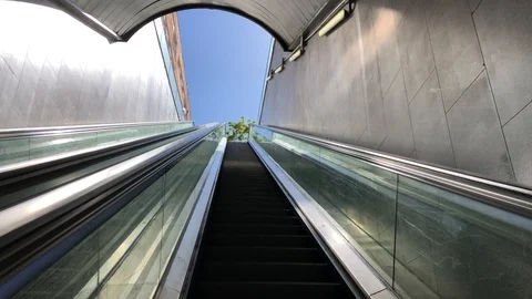 Going up on escalator in Barcelona Stock Footage 107918884