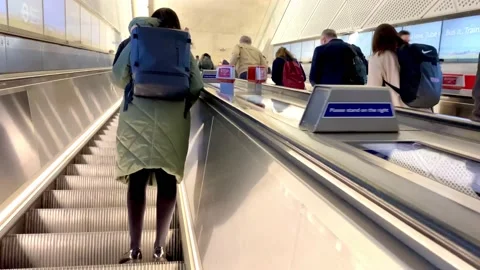 Going up on an escalator Stock Footage 233778451