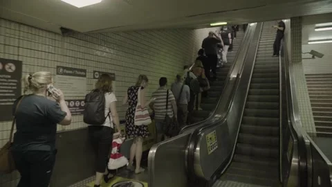 Going up escalator with people Video stock 145572287