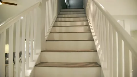 Going up the house stairs to the second floor. Stock Footage 207533176