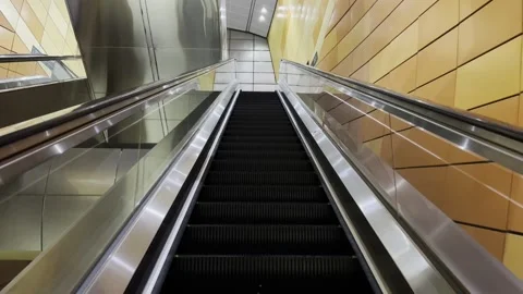 Going up long escalator Stock Footage 164653537