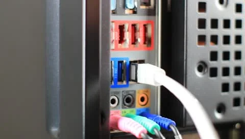 Going Offline - Hand Plugs off Network Cable from Computer Stock Footage 10479386