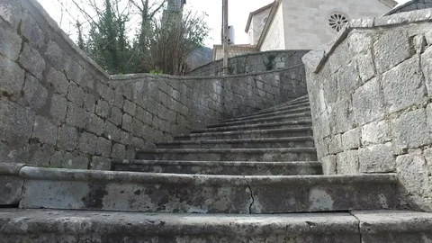 Going up on old stone stairs Stock Footage 87234832