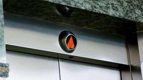 Going up or down button on a modern building elevator Stock Footage 83203414