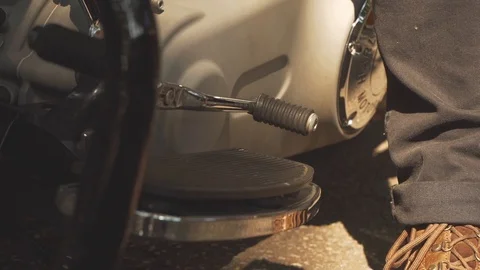 Going out with a motorcycle. Harley davidson. Leaving. Foot. Riding. Stock Footage 105372699