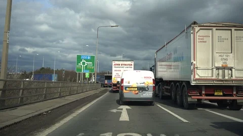 Going over a large roundabout to join the M25 motorway, 4k,uk Stock Footage 86829164