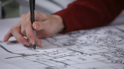 Going over the plans close Stock Footage