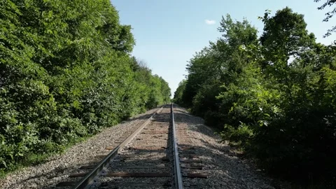 Going over the single Train Tracks Stock Footage 245749898