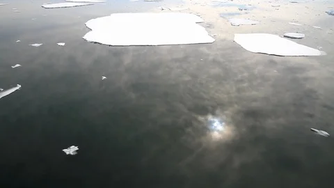 Going past floating ice in Antarctica Stock Footage 88285219