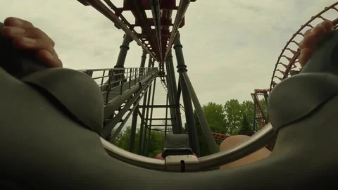 Going up with a roller coaster looking to the sky. Stock Footage 247134768