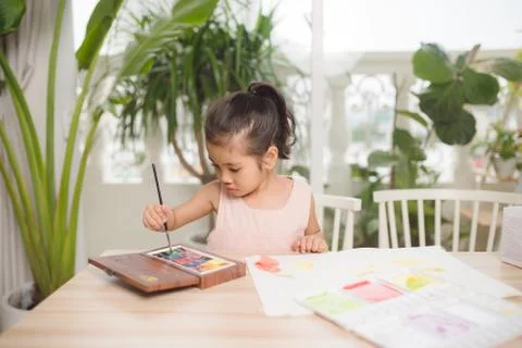 Going to school is your future. Education, learning, teaching. a young girl c Stock Photos