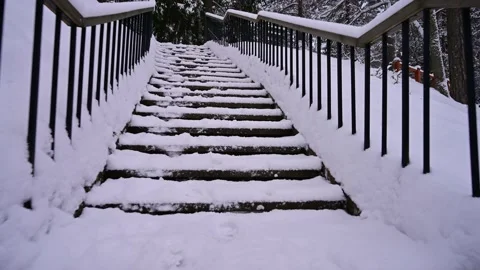 Going up to the second level from the snowy stairs. Stock Footage 236313226