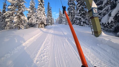 Going up on a ski lift. Stock Footage 85579706