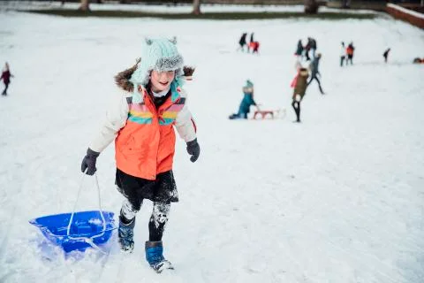 Going Sledding in the Snow Fotos Stock