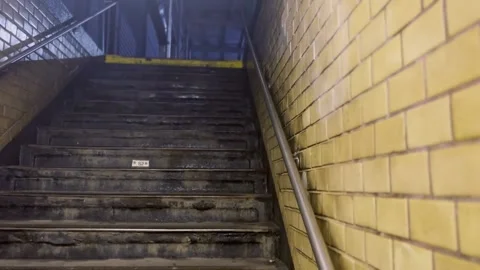 Going up station stairs Video stock 196849253