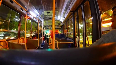 Going through the city in a bus at night 스톡 동영상 71151597