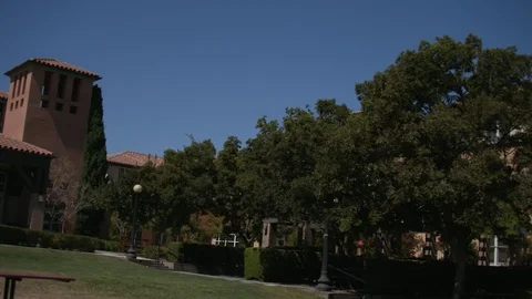 Going through a college campus in slow motion Stock Footage 103869115