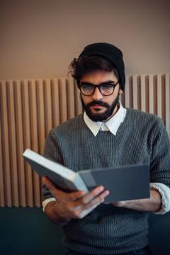 Going through his notes Stock Photos