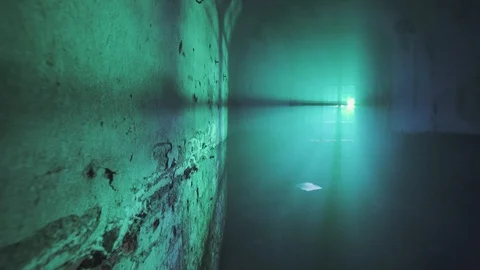 Going towards green light rays in a dark window Stock Footage 105299602