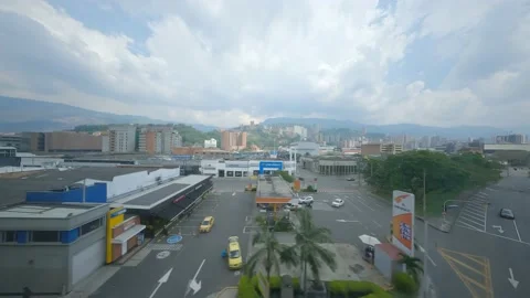 GOING UP THE TRAIN TRACK, OVERLOOKING MEDELLIN Stock Footage 234469759