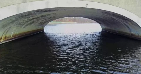 Going Under Bridge Along River Stock Footage 76237739