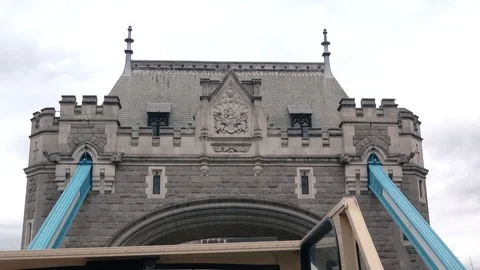 Going under tower bridge in London on a tourist bus  Stock Footage 113045520