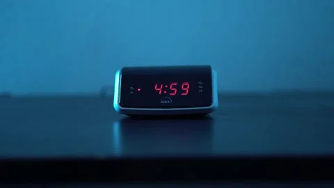 Goirle, The Netherlands - December 17, 2019 - Alarm Clock Going Off At 5 AM Stock Footage
