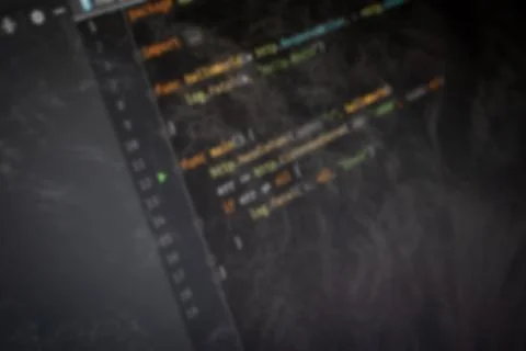 GoLang Hello World code on screen blurry background image 写真素材