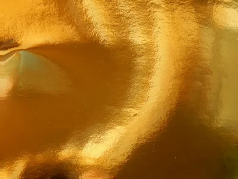Gold alloy wave flow closeup Stock Footage 112754529