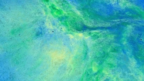 Gold and blue explode with green 2 vibrant bright paint and oil color swirls Stock Footage 81705335