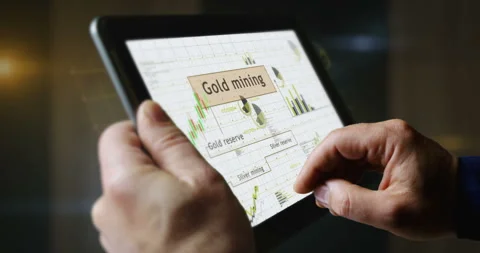 Gold and silver charts graphs on touchscreen pad display Stock Footage 330026115
