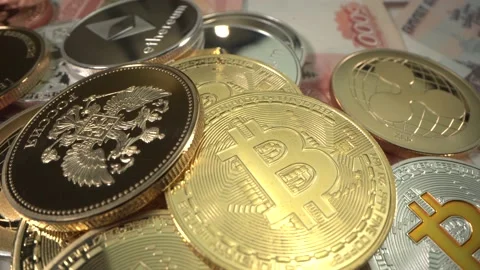 Gold and silver cryptocoins Bitcoin, Etherium, Zcash lies on money and rotating Stock Footage 142311941
