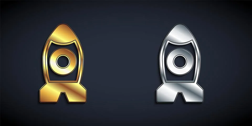 Gold and silver Rocket ship toy icon isolated on black background. Space travel Stock Illustration